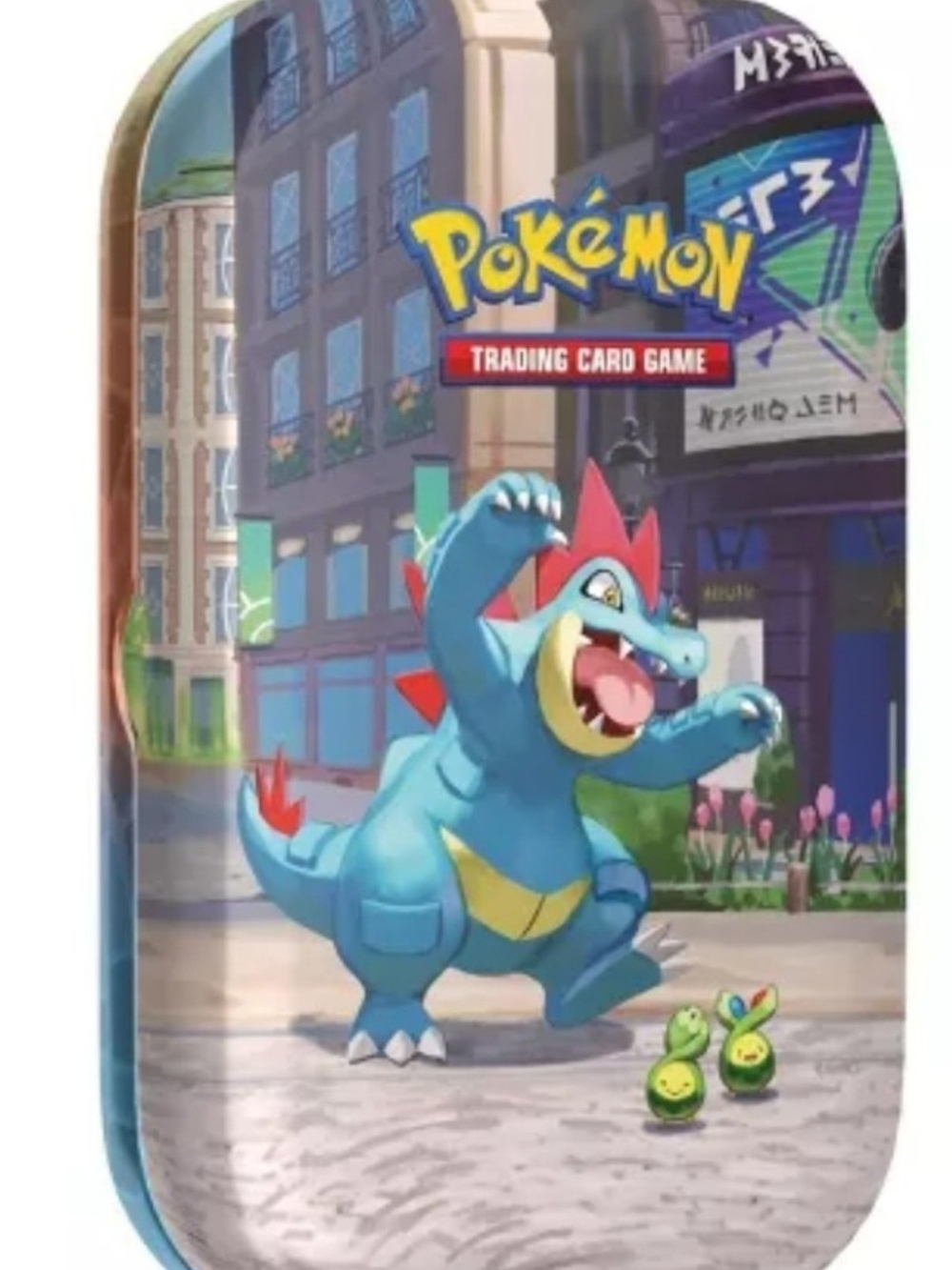 Lumiose City Mini Tin featuring Feraligatr and Budew.